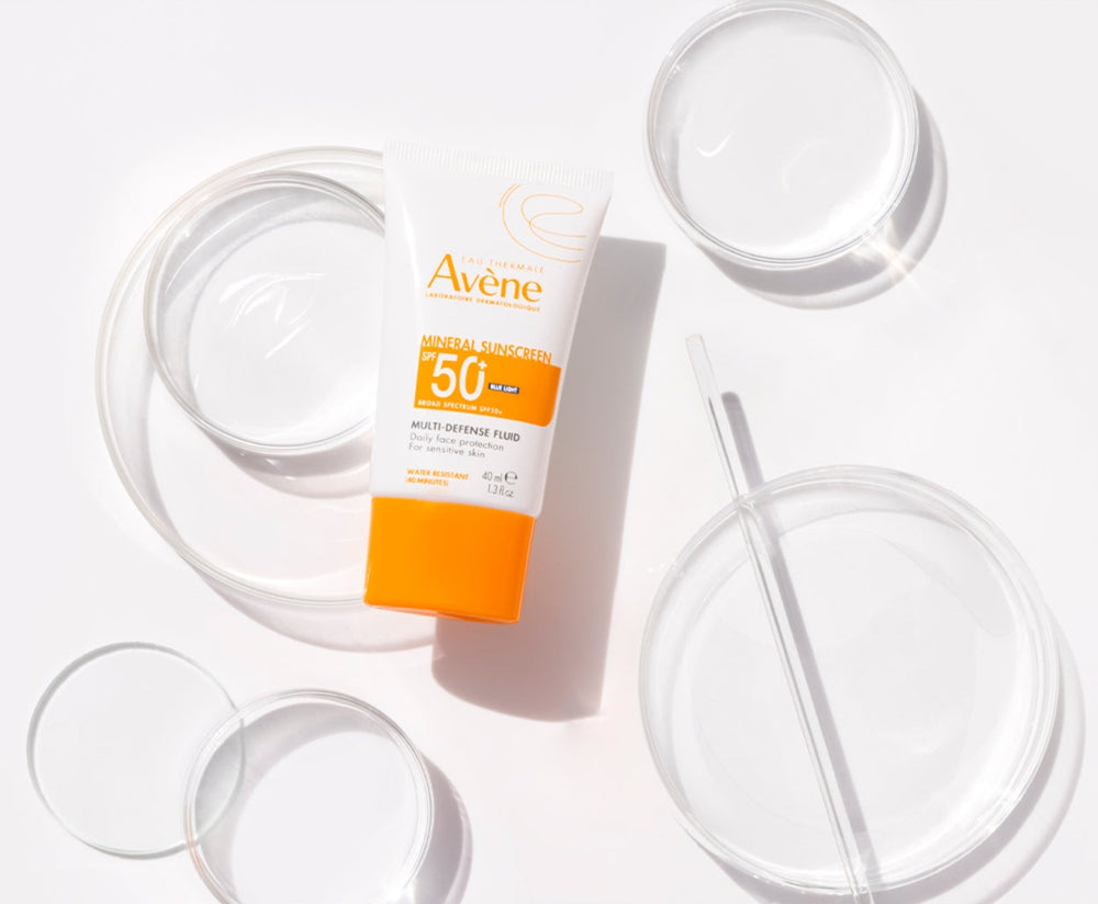 Mineral Sunscreen Multi-Defense Fluid SPF 50+ Lifestyle Image 1